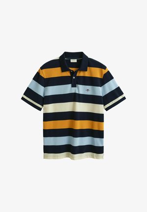 Pruhovaná polo tričko ve tmavě modré, světle modré, žluté a krémové barvě. Krátké rukávy a límec na tři knoflíky se malým vyšívaným logem.