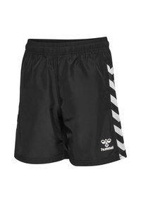 Svarta idrottsbyxor i lättviktsmaterial, med en flexibel midja, vit chevronmönster på sidorna, och en logotyp på den nedre framsidan.