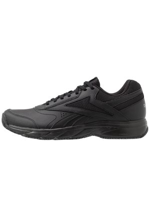 Black athletic sneaker with lace-up design, textured sole, and padded collar, shown in side profile on a white background.