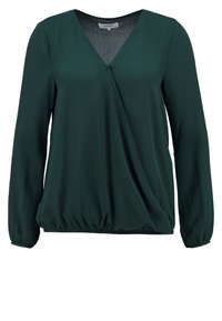 Blusa verde a maniche lunghe con scollatura a V e design avvolgente, caratterizzata da orlo arricciato e texture della stoffa liscia.