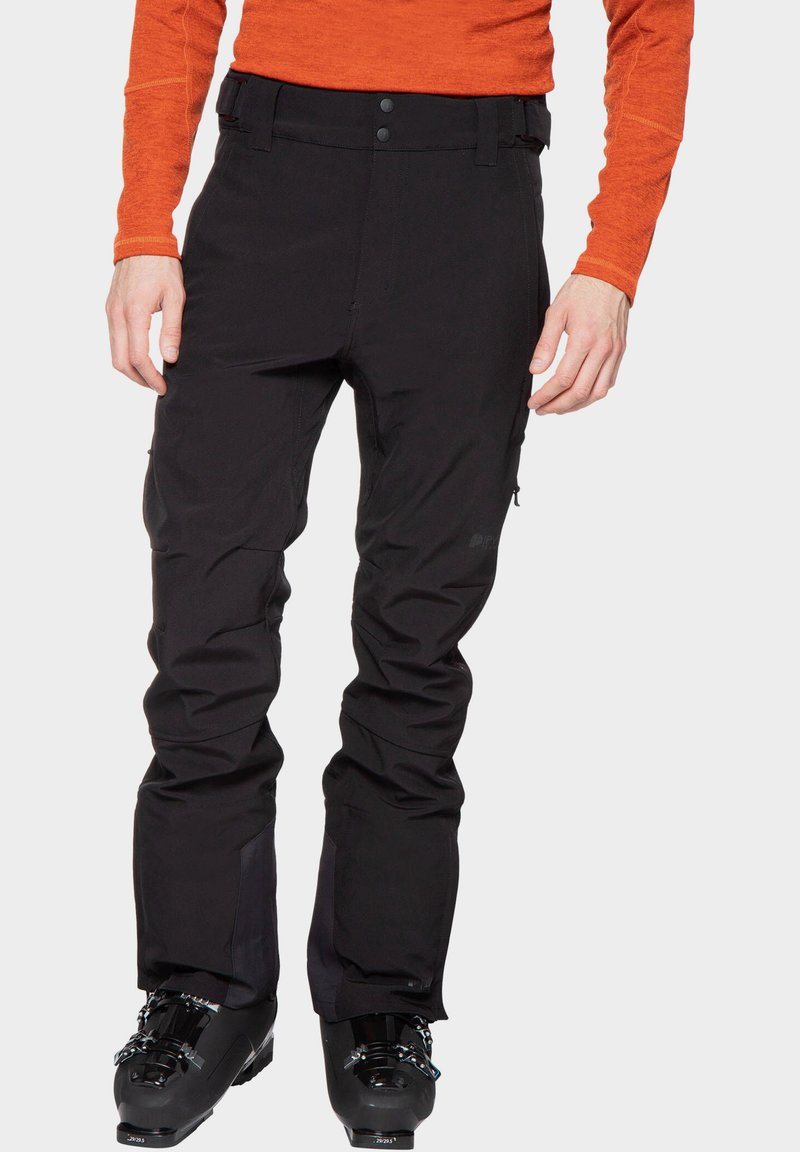 Schwarze Skihosen aus robustem Material, mit geradem Schnitt, Reißverschlussbelüftung und verstellbarem Taillenbund mit Druckknopfverschluss.