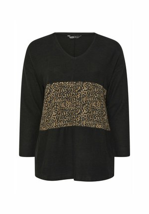 Top negro de cuello en V con mangas tres cuartos, que presenta un panel de estampado de leopardo en la parte media. Tejido suave con un corte relajado.