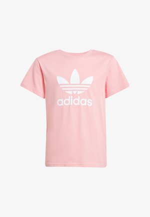 Lyserød bomulds T-shirt med korte ærmer, der har en stor hvid Adidas-logo og et tre-bladet grafisk design på forsiden.