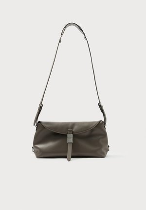 Dark gray leather handbag with a flap closure, adjustable strap, and silver-tone hardware in a simple, rounded design.