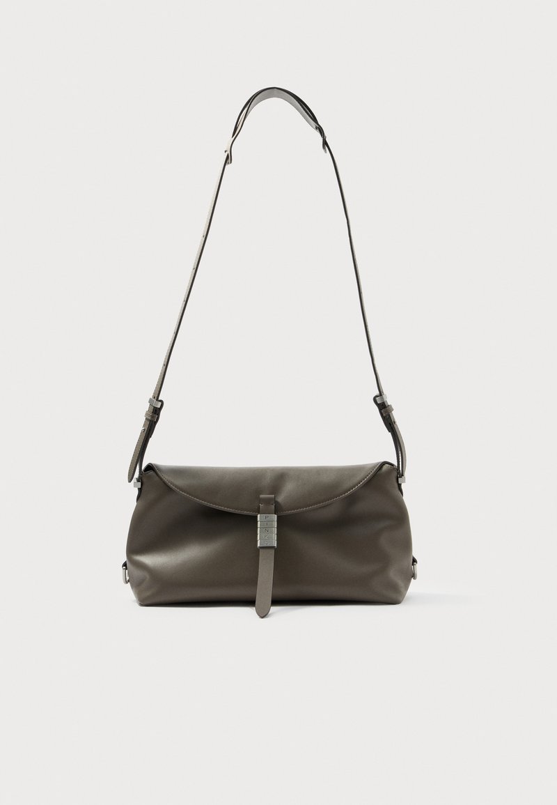 Dark gray leather handbag with a flap closure, adjustable strap, and silver-tone hardware in a simple, rounded design.