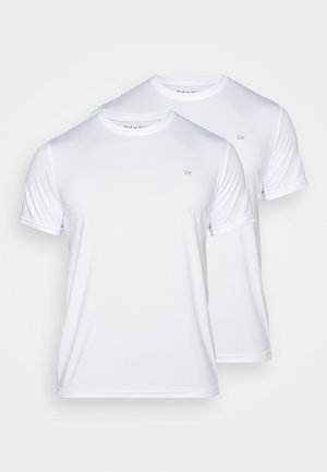White, short-sleeve crew neck T-shirts made from lightweight fabric, featuring a subtle CK logo on the chest. Twin pack design.