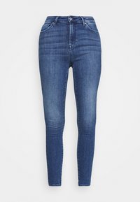Jeans skinny feitos de denim azul escuro com cintura alta, cinco bolsos e fecho clássico com botão e zipper. Textura suave com mínimas desgastes.