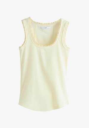 Sleeveless pale yellow ribbed tank top with lace trim around the neckline and armholes, labeled "NEXT" on the inside collar.