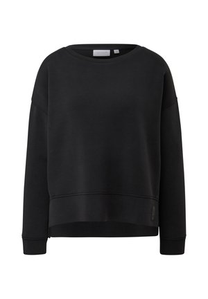 Sweat-shirt noir à manches longues col rond avec poignets et bas côtelés, doté d'une petite étiquette logo cousue près de l'ourlet inférieur.