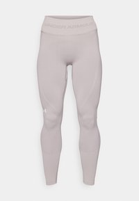 Világosszürke leggings, testhezálló fazonnal, sima anyagból készült. Széles derékpánt jellemzi, rajta az "Under Armour" felirattal és finom varrási részletekkel.