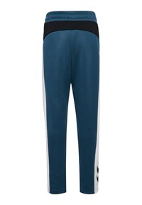 Teal sportbroeken met een zwarte tailleband, voorzien van witte zijpanelen en een klein logo op het onderbeen. Gemaakt van gladde, lichte stof.