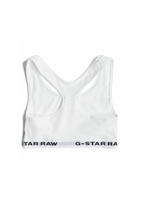 Bílé sportovní podprsenka se zaobleným zadním dílem, která má černý a šedý elastický pás s nápisem "G-STAR RAW". Měkká, elastická bavlněná tkanina.