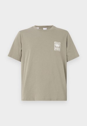 T-shirt à manches courtes, col rond en coton kaki. Doté d'un petit motif blanc imprimé sur la poitrine gauche. Ourlet droit ; texture douce.