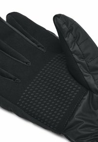Black insulated gloves with a smooth exterior and textured grip pattern on the palm. Features stitched seams and elongated wrist area for warmth.