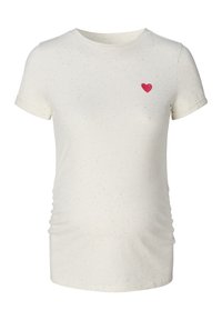 Camiseta premamá en color crema con textura jaspeada, mangas cortas, cuello redondo y bordado de corazón rosa en el pecho. Laterales fruncidos para un mejor ajuste.