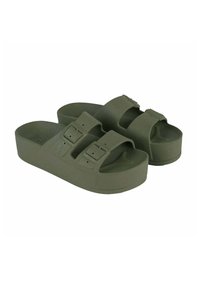 Sandales en plateforme vertes avec deux brides réglables à boucle, fabriquées en matériau en caoutchouc lisse, présentant une semelle épaisse et un design minimaliste.