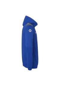 Sweat-shirt à capuche bleu fabriqué en tissu doux. Présente un motif à pois jaunes sur l'épaule et des poignets élastiques. Poches latérales incluses.