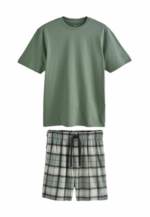 Green cotton t-shirt with a round neckline, paired with plaid shorts in green, black, and white, featuring an elastic waistband and drawstring.
