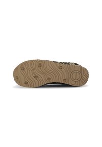 Semelle de chaussure avec une texture ondulée en caoutchouc brun clair. Présente des motifs de semelle circulaires et un cercle de marque au niveau du talon.