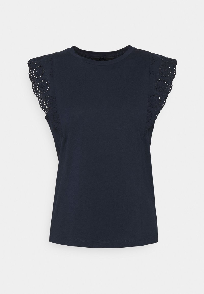 T-shirt bleu marine à manches courtes avec des détails en dentelle le long des bords des épaules. Tissu doux et encolure ras de cou. Ajustement décontracté.