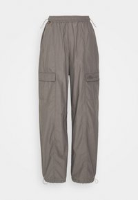 Šedé cargo kalhoty s elastickým pasem, šňůrkou a dvěma bočními kapsami s klopami. Hladký povrch a volný střih.