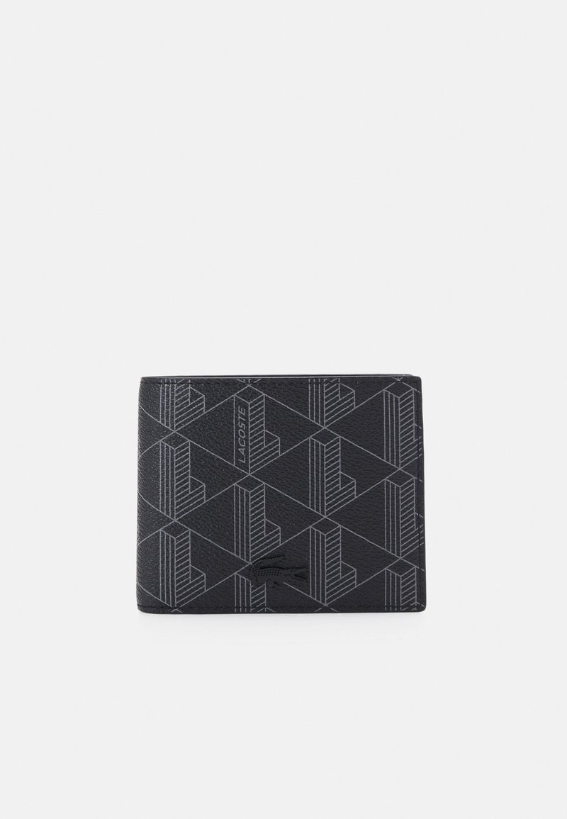 Portafoglio nero con un motivo geometrico testurizzato e logo Lacoste in una tonalità a contrasto. Finitura liscia con forma rettangolare.