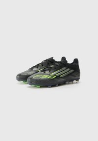 adidas Performance F50 ELITE UNISEX - Firm-ground football boots - core black/iron/lucid lemon