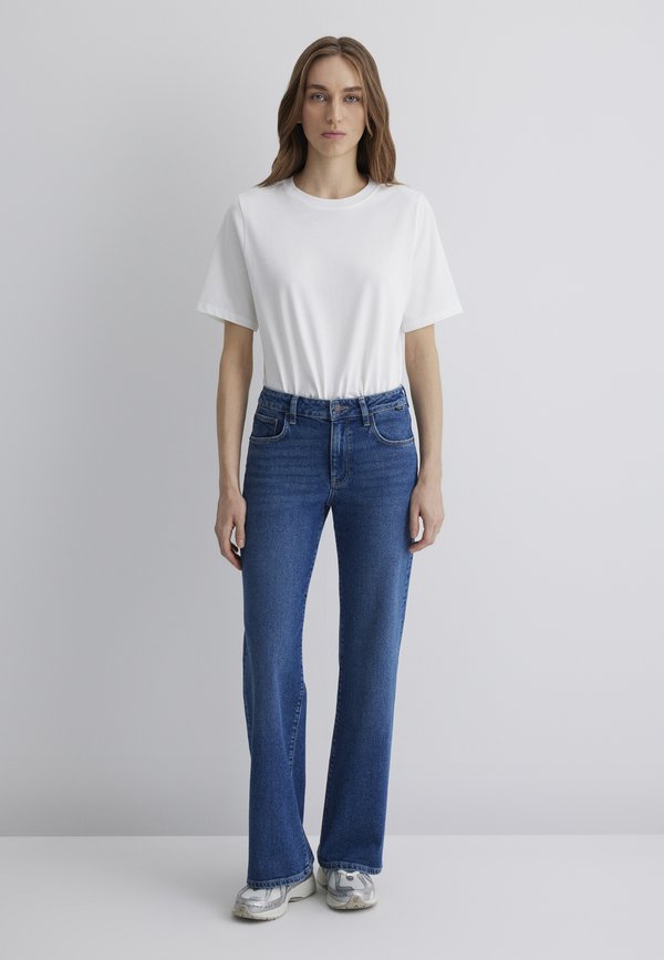 IBIZA - Flared Jeans - indigo