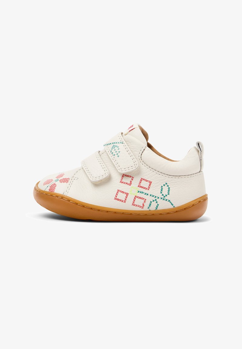 White leather sneaker with two velcro straps, rubber sole, colorful floral and geometric embroidery, and a rounded toe design.
