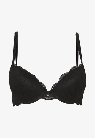 Svart blond BH med polstrede kopper, bølgede kanter og justerbare stropper. Har en dekorativ clasp med en liten logo aksent.