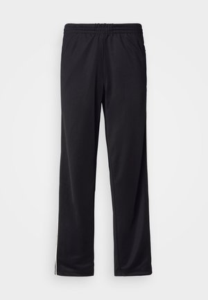 Black athletic pants with elastic waistband and straight legs, featuring subtle side stripes on a plain background.