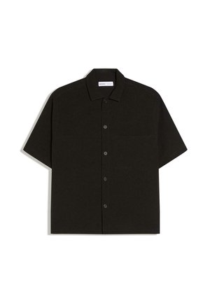 Short-sleeve black shirt made from soft fabric, featuring a button-up front, collar, and a single chest pocket. Simple, clean design.