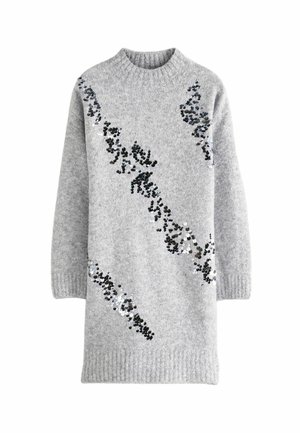 Robe grise en tricot avec un col montant, ornée de sequins métalliques noirs et argentés formant un motif ondulé. Détails aux poignets et à l'ourlet côtelés.