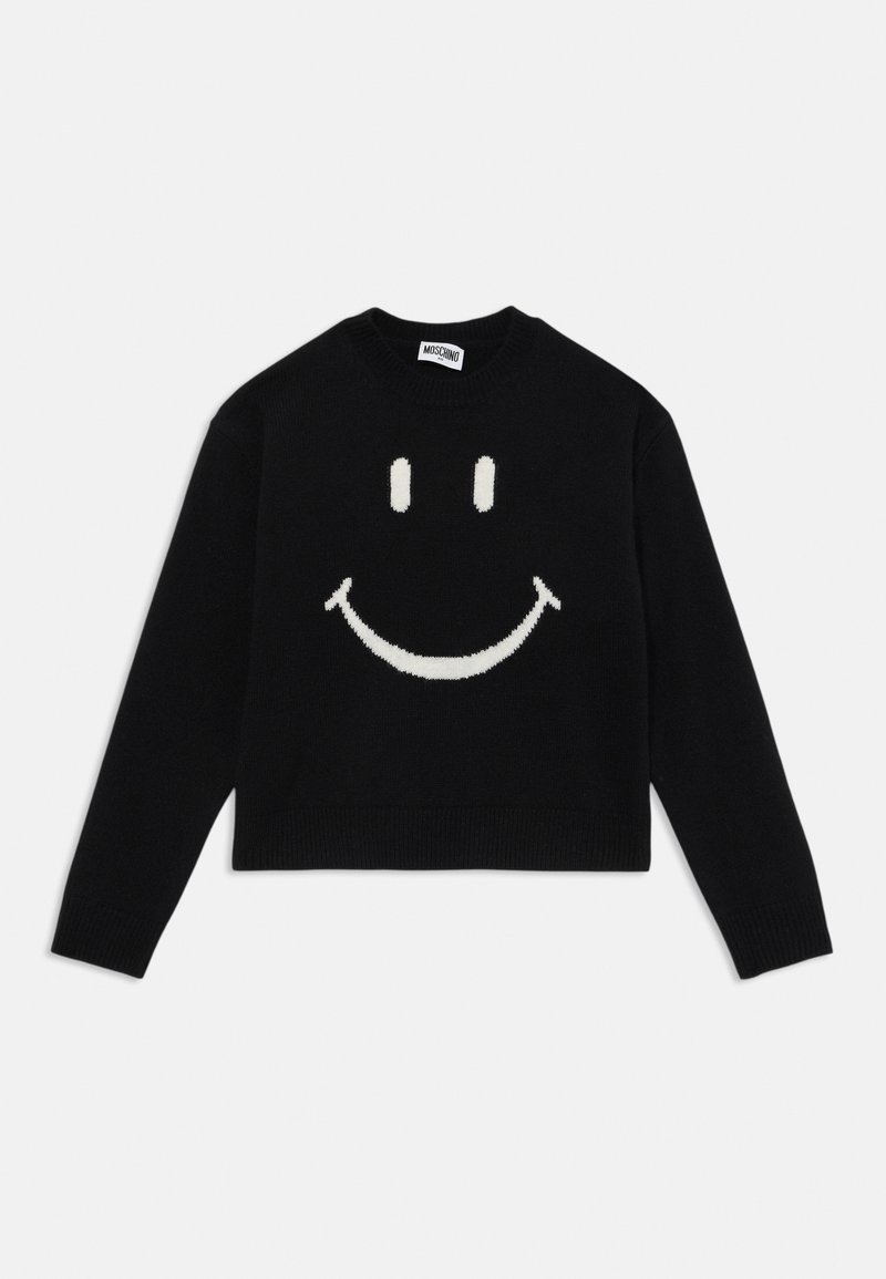 Pulôver preto curto feito de tecido de malha, apresentando um grande design de sorriso branco na parte da frente. Detalhes em canelado nas mangas e no decote.