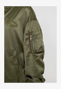 Niet geselecteerd, kaki