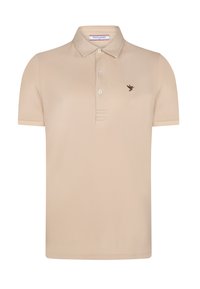 Beige polo skjorte lavet af tekstureret stof, med en tre-knaps placket, korte ærmer og et lille brunt fuglelogo på brystet.