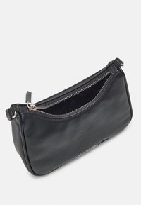 Black leather clutch bag with a textured finish, a zippered top, and silver hardware accents. Features a curved silhouette for ease of access.
