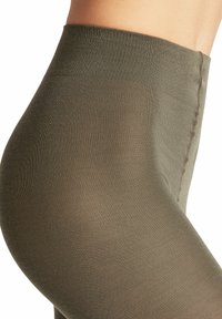 Olijf groene hoge taille leggings met een gladde, rekbare textuur en een geribde tailleband, die zorgen voor een aansluitende silhoeet.