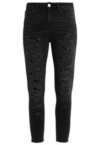 Pantalones vaqueros skinny de mezclilla negra de cintura alta, con desgarros desgastados en la parte delantera y una textura suave. Diseño clásico de cinco bolsillos.