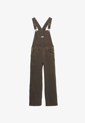 Barna pamut kantárosnadrág állítható pántokkal, elülső zsebbel és oldalsó gombokkal. Széles szabású, sima, tartós textúrával.