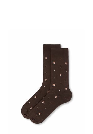 Paar dunkelbraune Socken mit kleinen Fuchskopf- und weißen Punktmustern, die über den Stoff verstreut sind.