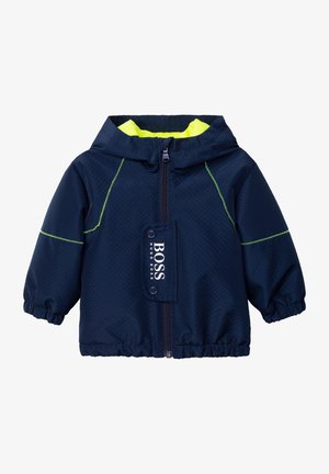 Marineblå toddlerjakke med hætte, neon gul foring, grøn syning, frontlynlås, elastiske manchetter og en flap med mærket "BOSS HUGO BOSS".