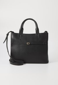 Black leather handbag with a pebbled texture, short dual handles, an adjustable shoulder strap, and a front gold buckle detail.
