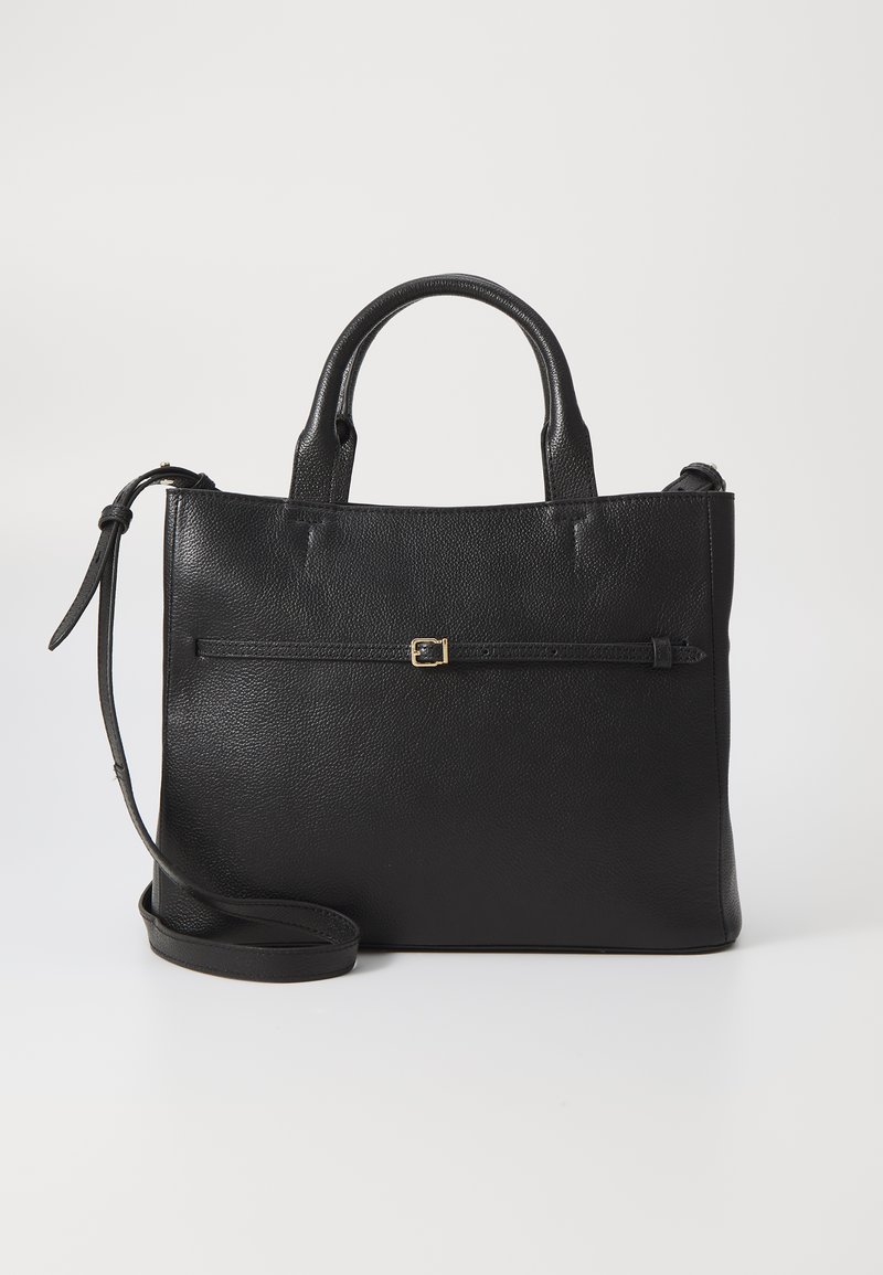 Black leather handbag with a pebbled texture, short dual handles, an adjustable shoulder strap, and a front gold buckle detail.