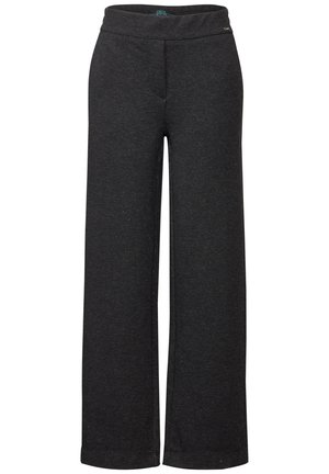 Pantalons larges noirs en tissu doux avec une taille élastique. Dotés d'une finition lisse et texturée et d'un motif subtil à pois.