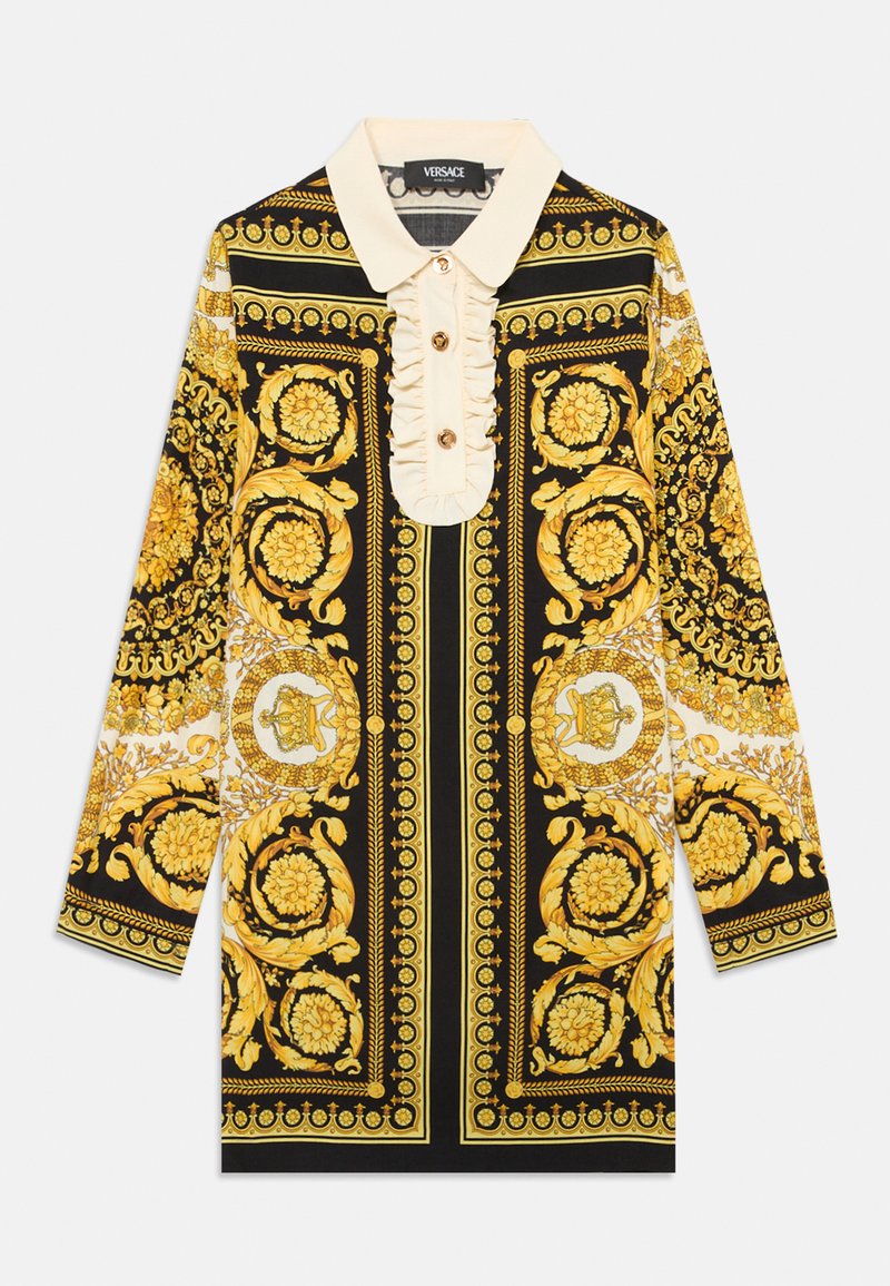 Melnas un zelta garās piedurknes kleita ar sarežģītu baroka rakstu, krēmkrāsas apkakli un pogu akcentiem. Iezīmēta ar izsmalcinātu piegriezumu un strukturētu dizainu.