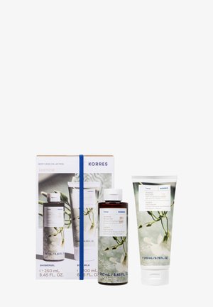Jasmin-Duftendes Korres Körperpflege-Set mit 250 ml Duschgel und 200 ml Körpermilch, mit botanischem Design und weißen Verschlüssen.
