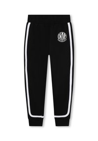 Pantalons de sport noirs avec des rayures blanches sur les côtés et un logo circulaire, dotés d'une taille élastique et de ourlets fuselés. Texture de tissu lisse.