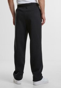 Urban Classics Tracksuit bottoms - black