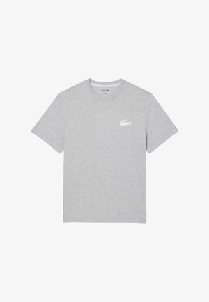 T-shirt grigio in cotone con maniche corte, colletto rotondo e un piccolo logo bianco di coccodrillo sul lato sinistro del petto. Tessuto liscio su tutta la superficie.